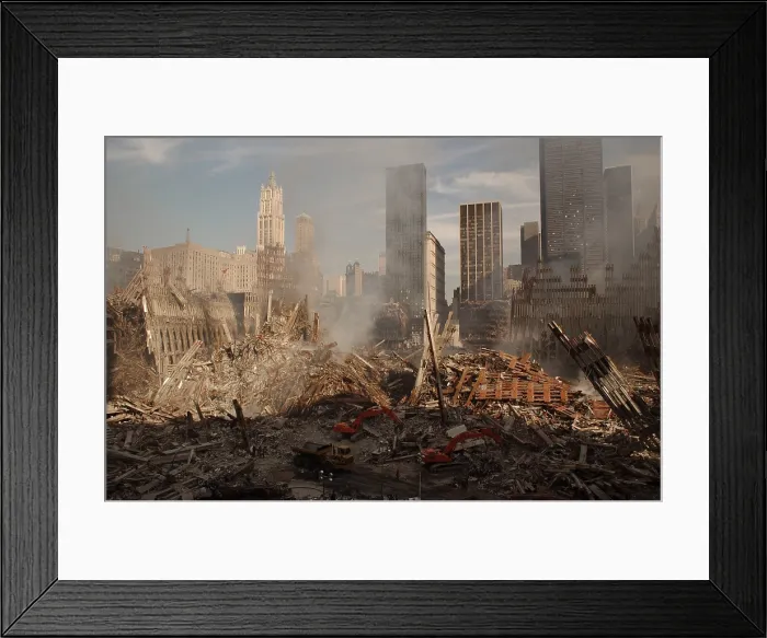 Framed Print : Wide view of the ruins of the World Trade Center complex in New York City, Sept. 18, 2001. At left is the pile and faade arches of the North Tower, WTC 1