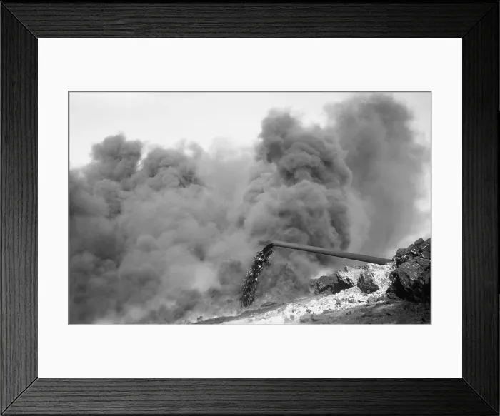 Framed Print : Clouds of black smoke obscure fire on an Iraq Petroleum Company well in the Kirkuk District of Iraq. 1932