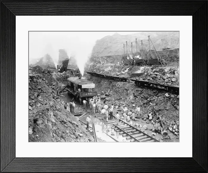 Framed Print : Panama Canal construction cutting through the mountains of the continental divide with steam powered machinery. 1913