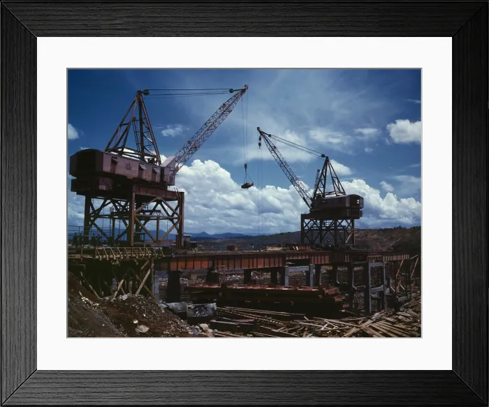 Framed Print : Huge Cranes lift steel beams during the construction of Tennessee Valley Authority's Douglas Dam Framed Print : Huge Cranes lift steel beams during the construction of Tennessee Valley Authority's Douglas Dam
