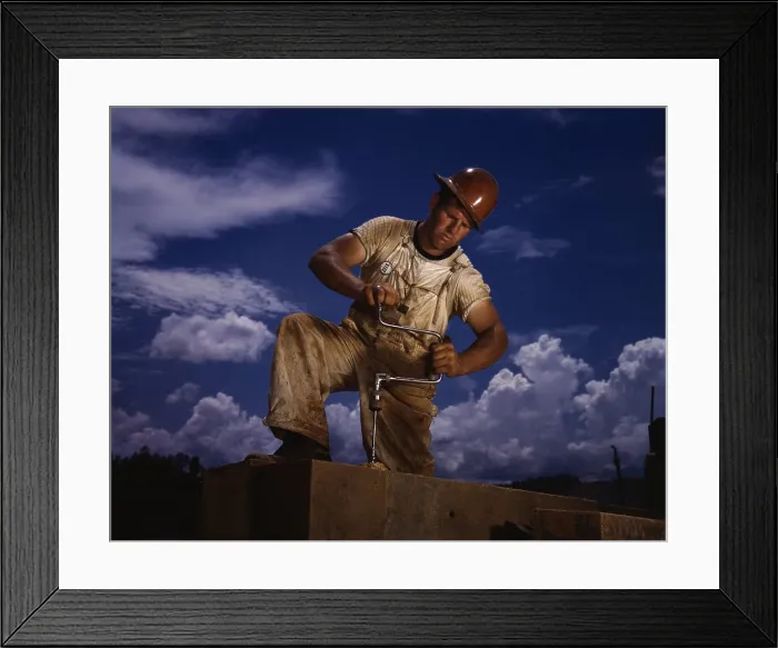 Framed Print : A carpenter working at the Tennessee Valley Authority's Douglas dam on the French Broad River. June 1942