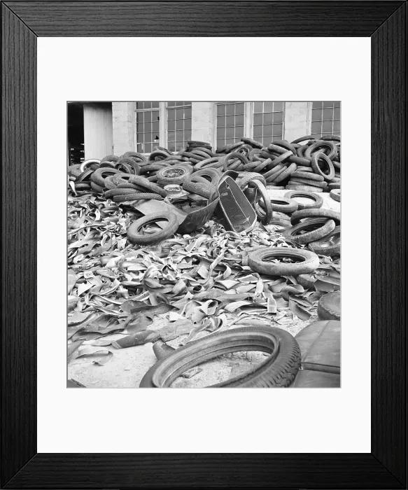 Framed Print : Rubber tires gathered to be recycled in August, 1941. World War II reduced rubber imports and increased demand, causing rubber to be rationed throughout the war Framed Print : Rubber tires gathered to be recycled in August, 1941. World War II reduced rubber imports and increased demand, causing rubber to be rationed throughout the war