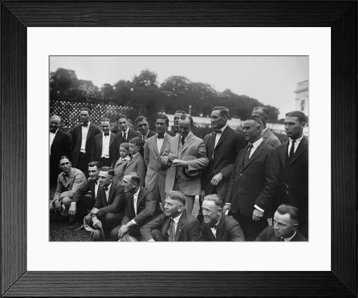 Framed Print : President Calvin Coolidge autographing a baseball for star pitcher, Walter Johnson. Sept. 5, 1924