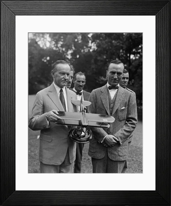 Framed Print : President Calvin Coolidge examines a model airplane, presented by aviator Eddie Rickenbacker. Sept. 14, 1925. While visiting the White House, Lt Framed Print : President Calvin Coolidge examines a model airplane, presented by aviator Eddie Rickenbacker. Sept. 14, 1925. While visiting the White House, Lt