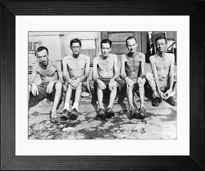Framed Print : Five men liberated from the Santo Tomas internment camp in Manila, Feb. 23, 1945. L-R: Arehugo G