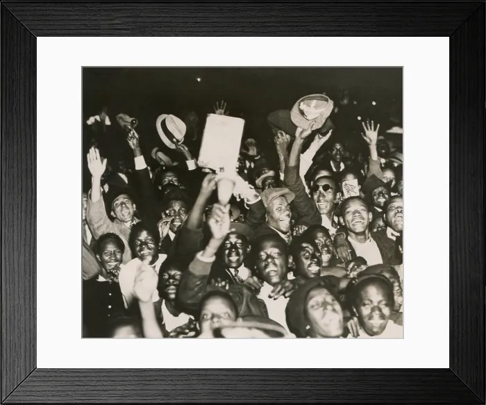 Framed Print : African American New Yorkers celebrate the victory of Heavyweight Boxer Joe Louis against Max Baer. Sept. 30, 1935. - (BSLOC_2014_17_149) Framed Print : African American New Yorkers celebrate the victory of Heavyweight Boxer Joe Louis against Max Baer. Sept. 30, 1935. - (BSLOC_2014_17_149)