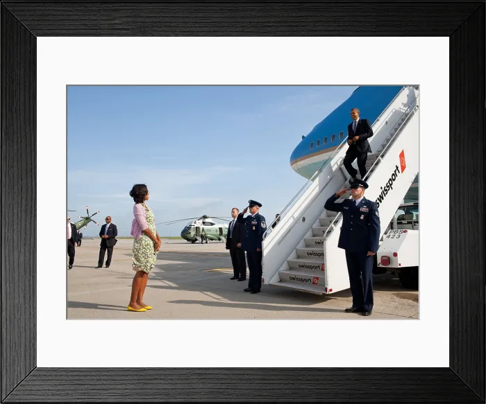 Framed Print : First Lady Michelle Obama waits to greet the President Obama at JFK Airport in NYC. June 14, 2012. (BSLOC_2015_13_136)