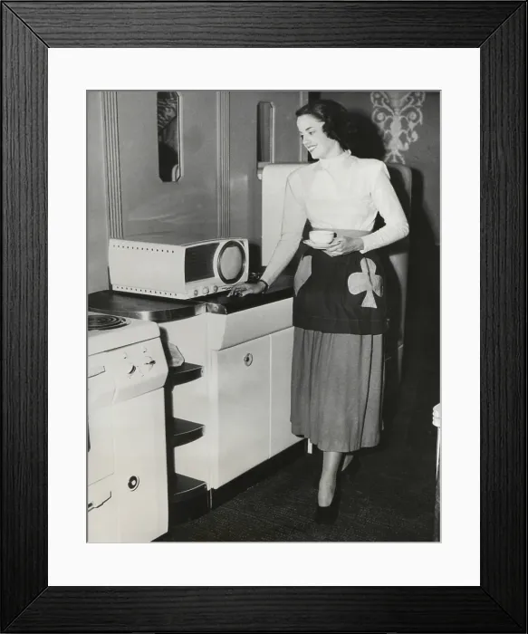 Framed Print : A television in the kitchen for the first broadcast of a cooking show in New York. Sept. 1949. - (BSLOC_2014_17_135)