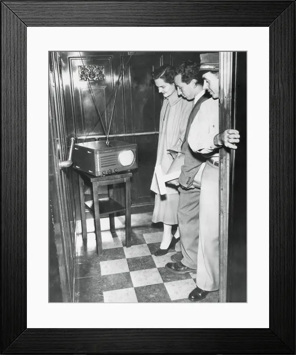 Framed Print : Portable television in a New York City elevator, Oct. 5, 1949
