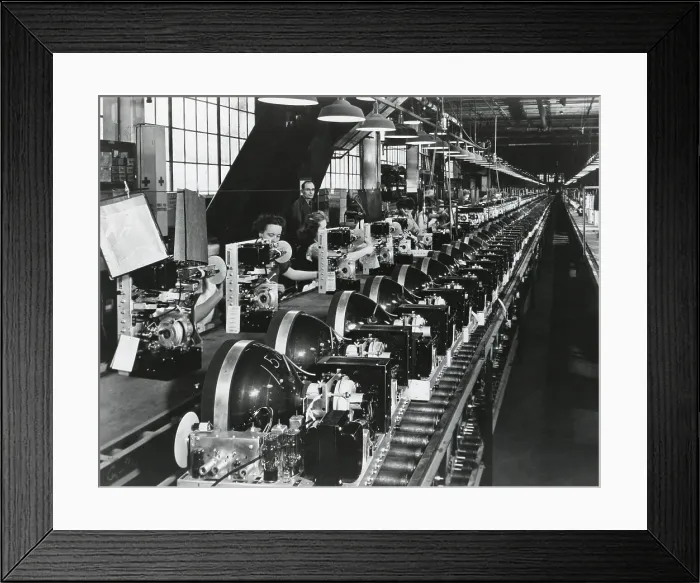 Framed Print : Television chassis on an assembly line with women workers in a U.S. factory. July 1949. - (BSLOC_2014_17_137)