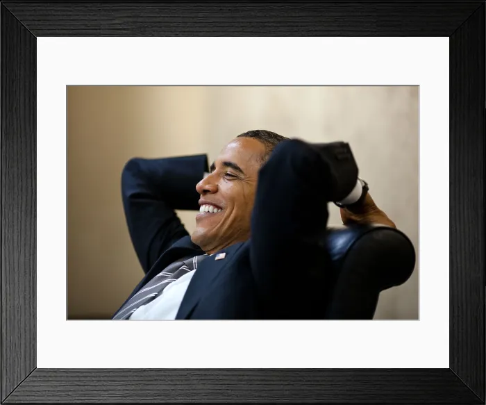 Framed Print : President Barack Obama has a relaxed moment in a meeting in the White House Situation Room. July 8, 2011. (BSLOC_2015_13_140)