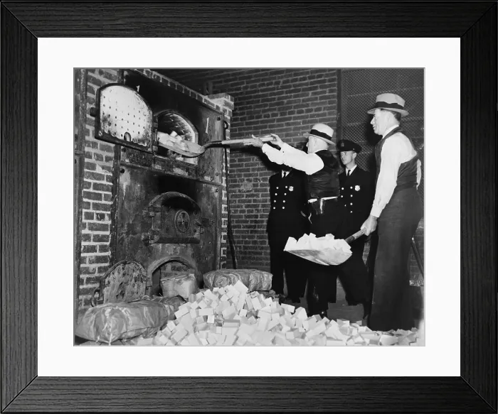 Framed Print : Federal Bureau of Narcotics agents shovel confiscated heroin blocks into incinerator in 1936 Framed Print : Federal Bureau of Narcotics agents shovel confiscated heroin blocks into incinerator in 1936