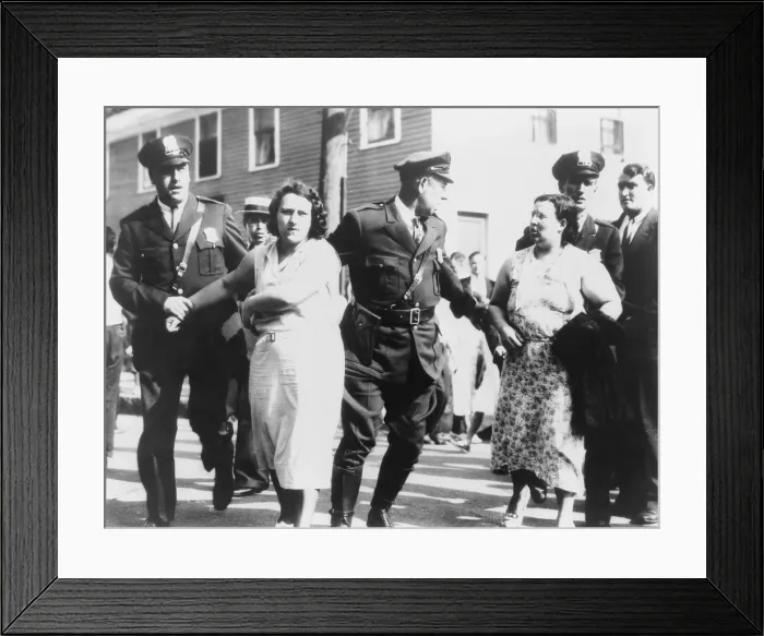 Framed Print : Women textile workers arrested by policemen for picketing the Jackson mill in Nashua, New Hampshire. Sept. 7, 1934