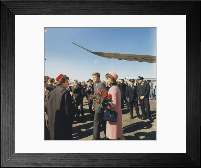 Framed Print : Assassination of President Kennedy. President and Jacqueline Kennedy arrive at Dallas's Love Field a few hours before he was killed by a sniper, Lee Harvey Oswald. Nov