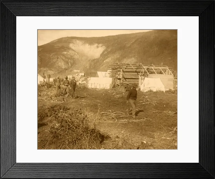 Framed Print : Men walking on Dawson City's Riverside Drive, in 1897 during the Yukon Gold Rush. The new street is lined with the town's first log and canvas structures