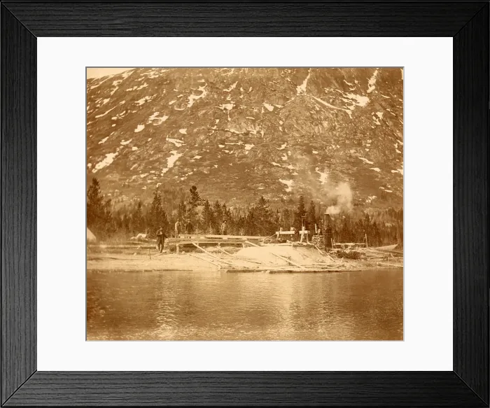 Framed Print : Steam-powered sawmill on the shore of Lake Bennett in the Yukon Territory, 1897. Portable steam engines supplied power for forest based lumber mills during the Gold Rush Framed Print : Steam-powered sawmill on the shore of Lake Bennett in the Yukon Territory, 1897. Portable steam engines supplied power for forest based lumber mills during the Gold Rush