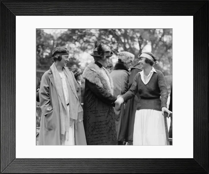 Framed Print : First Lady Florence Harding shaking hands with tennis champion, Molla Mallory. Marion Jessup looks on at the White House tennis court. May 10, 1922. (BSLOC_2015_16_5)