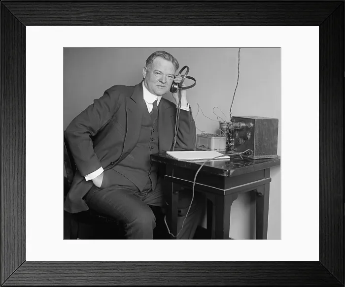 Framed Print : Herbert Hoover, Secretary of Commerce, listening to a radio on Dec. 31, 1924. (BSLOC_2015_16_50)