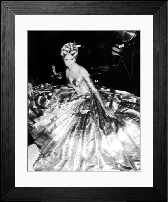 Framed Print : TO CATCH A THIEF, Grace Kelly, on-set in a gown by Edith Head, 1955