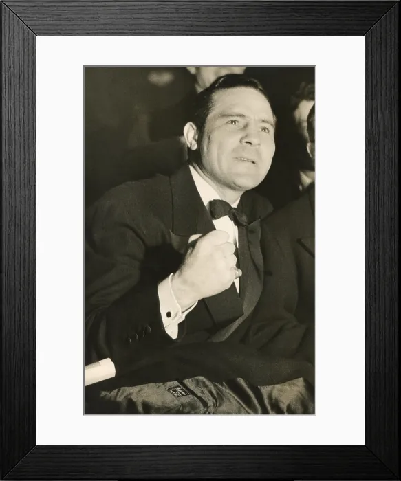 Framed Print : Max Baer watches the Ben Foord-Tommy Farr boxing match of March 3, 1937, with intense interest