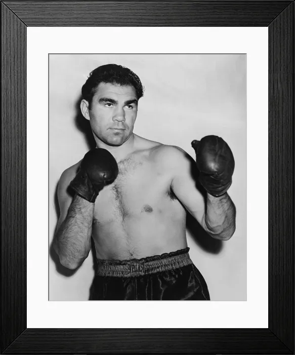 Framed Print : German boxer Max Schmeling in a boxing pose in 1938. On June 22, 1938 he lost in a rematch with American Joe Louis. - (BSLOC_2014_17_153) Framed Print : German boxer Max Schmeling in a boxing pose in 1938. On June 22, 1938 he lost in a rematch with American Joe Louis. - (BSLOC_2014_17_153)