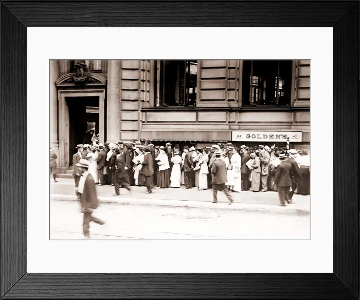 Framed Print : A long line of men and women line up in a run on the German American Bank of New York City. Ca. 1905-1915