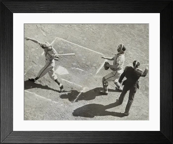Framed Print : St. Louis Browns Don Gutteridge striking out in the 2nd game of the 1944 World Series. St. Louis Cardinals catcher Walker Cooper is behind the plate. Oct. 5, 1944