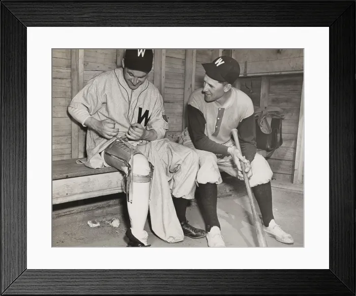 Framed Print : Washington Senators pitcher, Lt. Bert R. Shepard, as Manager Ossie Bluege looks on. March 30, 1945. The veteran pilot lost his lower right leg in WW2 Framed Print : Washington Senators pitcher, Lt. Bert R. Shepard, as Manager Ossie Bluege looks on. March 30, 1945. The veteran pilot lost his lower right leg in WW2