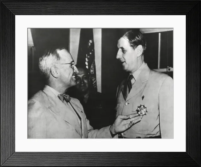 Framed Print : President Truman admires the Legion of Merit Degree Medal he has just awarded Charles De Gaulle. Outside this ceremony, their August 1945 meetings were tense