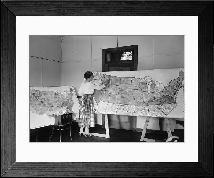 Framed Print : Women applying color to a large detailed map of the continental United States. Aug. 12, 1922
