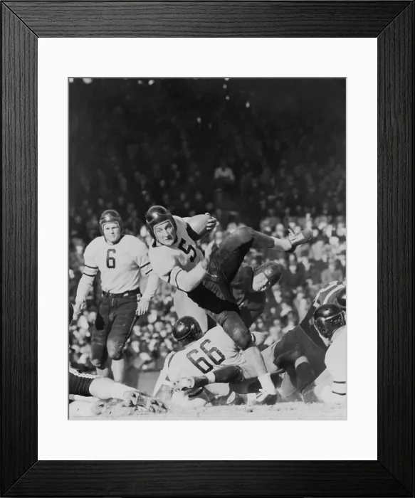 Framed Print : George McAfee, Chicago Bears back, sliding off Washington Redskins tackle for seven yards. 1940. He played for the Chicago Bears from 1940-1941, and 1945-1950 Framed Print : George McAfee, Chicago Bears back, sliding off Washington Redskins tackle for seven yards. 1940. He played for the Chicago Bears from 1940-1941, and 1945-1950
