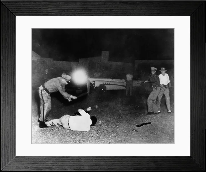 Framed Print : Violent arrest by Colorado police in 1953. The man on the ground is firing at police officer as other police fire at gunman