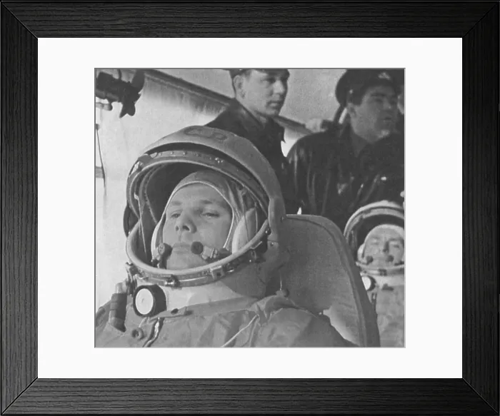 Framed Print : Yuri Gagarin before his historic 108-minute orbital flight of April 12, 1961. He was the first human in space. Behind him is backup Cosmonaut German Titov