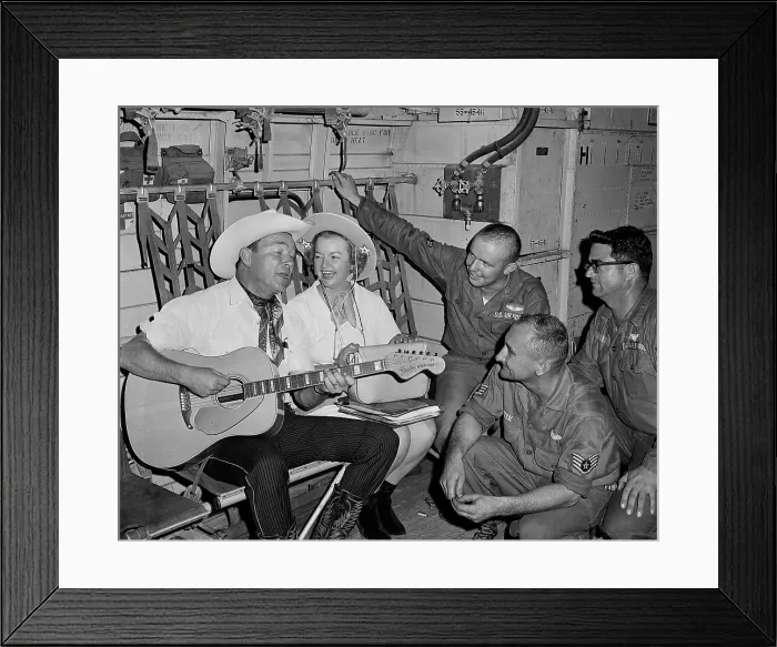 Framed Print : Roy Rogers and Dale Evans entertain troops in Vietnam. They sing for the crew of an Air Force C-123 transport while on a USO tour. Nov. 11, 1966