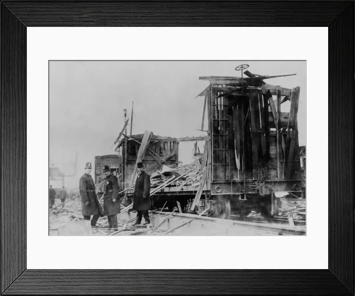 Framed Print : Two policemen and a civilian survey the ruins along the Lehigh Valley Railroad tracks where boxcars were riddled by exploding shells from munitions stored on barges tied up Framed Print : Two policemen and a civilian survey the ruins along the Lehigh Valley Railroad tracks where boxcars were riddled by exploding shells from munitions stored on barges tied up