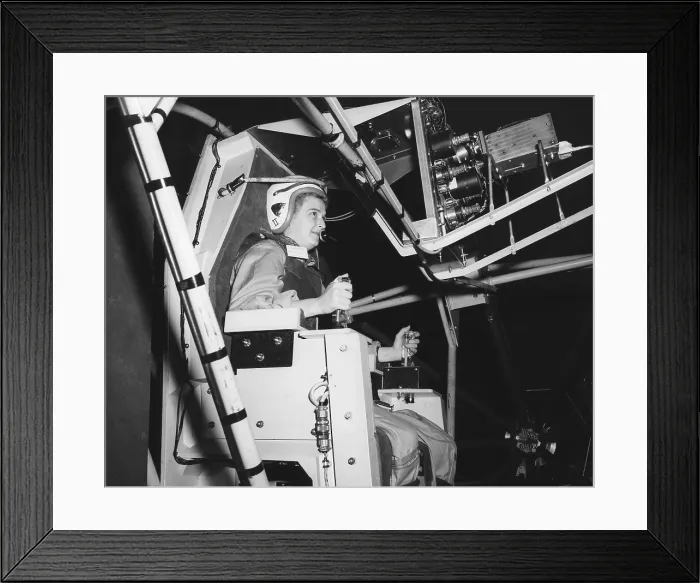 Framed Print : Jerrie Cobb, in astronaut training. She is learning to control the spin of a tumbling spacecraft Framed Print : Jerrie Cobb, in astronaut training. She is learning to control the spin of a tumbling spacecraft