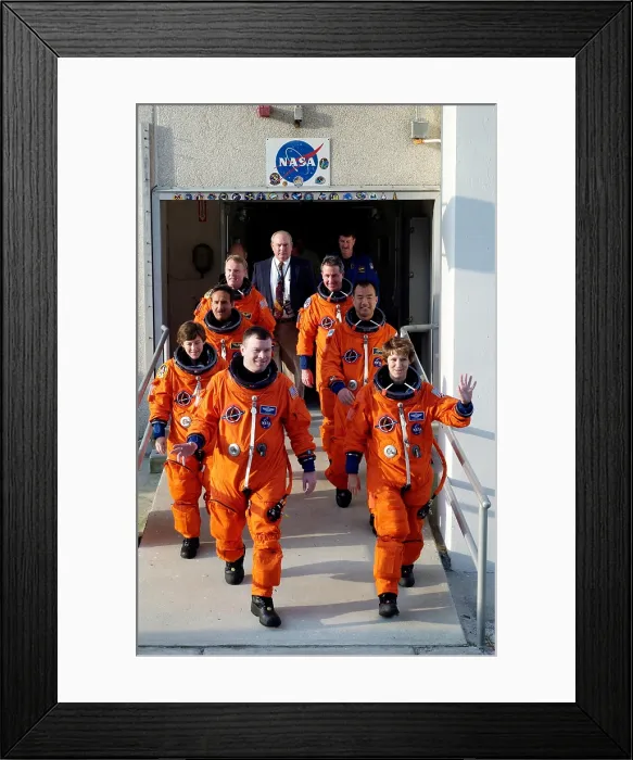 Framed Print : Commander Eileen Collins (right front, waving) with Space Shuttle Mission 114 crew en route to the Launch Pad. July 2005 Framed Print : Commander Eileen Collins (right front, waving) with Space Shuttle Mission 114 crew en route to the Launch Pad. July 2005