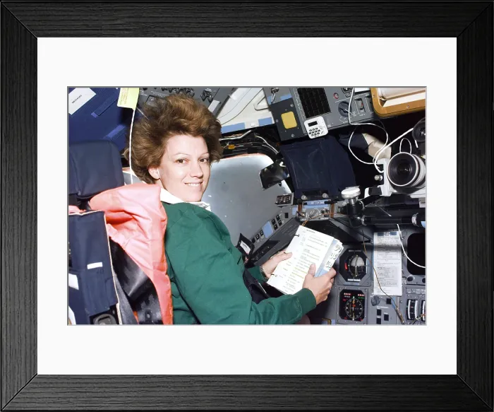 Framed Print : Commander Eileen Collins consults a checklist at the flight deck Commander's station in the Shuttle Columbia. July 24, 1999 Framed Print : Commander Eileen Collins consults a checklist at the flight deck Commander's station in the Shuttle Columbia. July 24, 1999