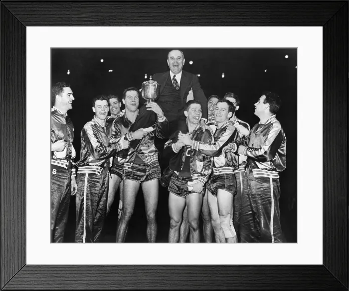 Framed Print : Coach Adolph Rupp on the shoulders of Kentucky Wildcats basketball team. They had just won the National Invitational Basketball Tourney in Madison Square Garden, New York City