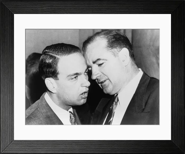 Framed Print : Senator Joseph McCarthy and his chief consul, Roy Cohn whispering during the Army-McCarthy hearings. June 11, 1954