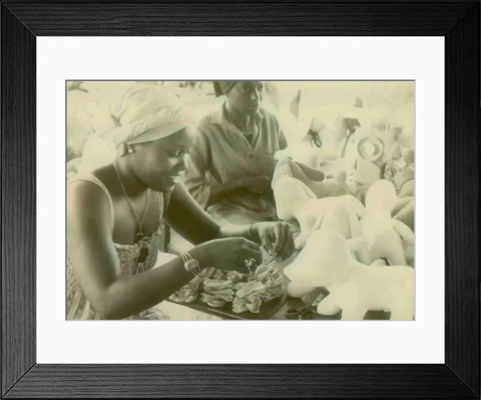 Framed Print : Woman making stuffed animals at the People's Temple Agricultural Project. Jonestown, Guyana. Nov. 1978 Framed Print : Woman making stuffed animals at the People's Temple Agricultural Project. Jonestown, Guyana. Nov. 1978