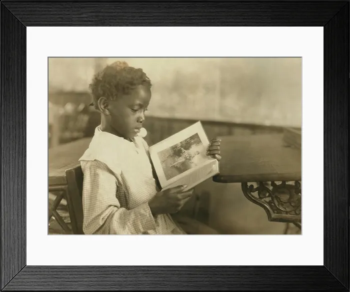 Framed Print : Young girl reading an illustrated book in Pleasant Green School, near Marlinton, West Virginia Framed Print : Young girl reading an illustrated book in Pleasant Green School, near Marlinton, West Virginia
