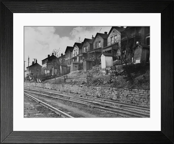 Framed Print : Old wooden housing with latrines in their backyards lining the railroad tracks in Cincinnati, Ohio