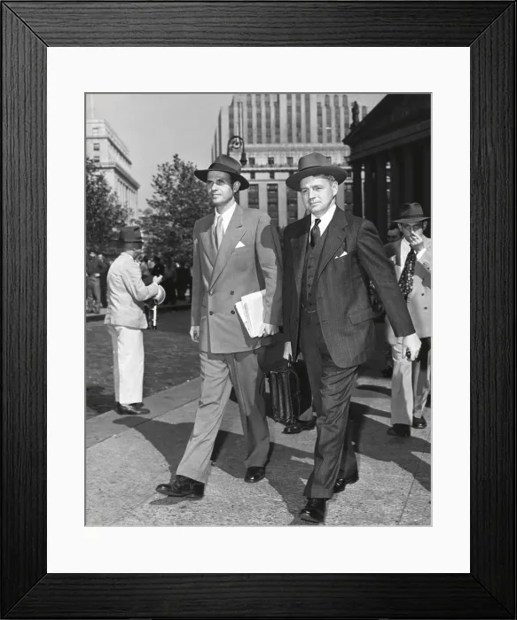 Framed Print : Alger Hiss and his lawyer, Edward McLean, leaving Federal Court on Oct 10, 1949. Hiss's second trial had just been adjourned until Nov 1st. New York City. - (BSLOC_2014_17_22)