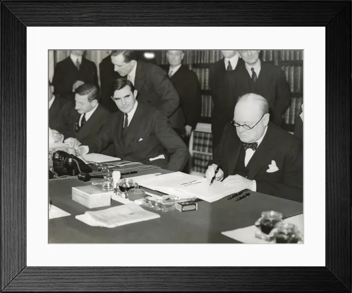 Framed Print : Winston Churchill signing the Lend Lease agreement to lease British bases to the U.S. March 11, 1941. From his desk at 10 Downing Street, Churchill and U.S Framed Print : Winston Churchill signing the Lend Lease agreement to lease British bases to the U.S. March 11, 1941. From his desk at 10 Downing Street, Churchill and U.S