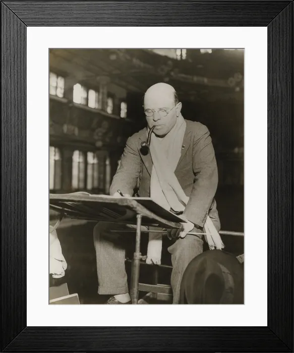Framed Print : Pablo Casals at rehearsal conducting the Barcelona Philharmonic Orchestra. Casals generally appears at rehearsal in a scarf around his neck and a pipe between his lips. Ca Framed Print : Pablo Casals at rehearsal conducting the Barcelona Philharmonic Orchestra. Casals generally appears at rehearsal in a scarf around his neck and a pipe between his lips. Ca