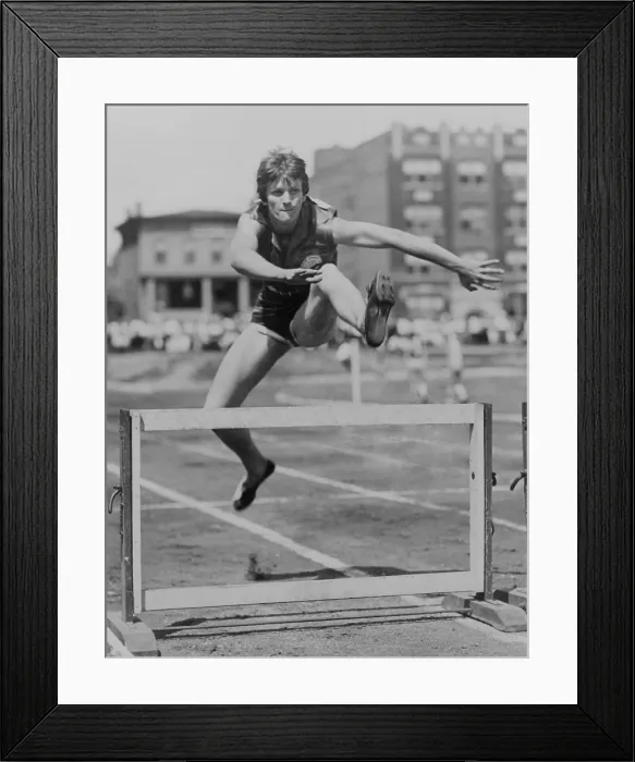 Framed Print : Babe Didrikson Zaharias clears hurdle at track meet in Jersey City, 1931. (BSLOC_2013_9_25)