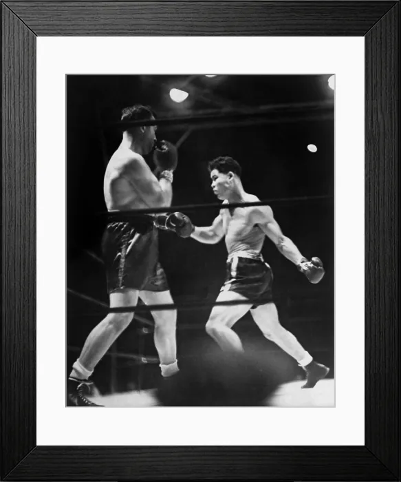 Framed Print : Joe Louis (right) in boxing match with Jack Sharkey at Yankee Stadium, New York. August 18, 1936. Louis won with a knockout in the third round. (BSLOC_2013_9_30)
