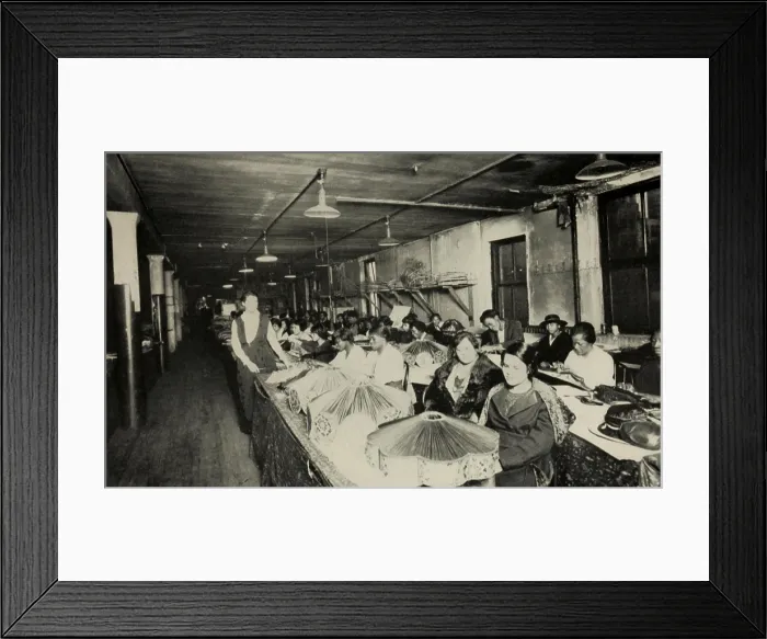Framed Print : African American women working in a lampshade factory in Chicago, ca. 1920. Approximately 40 women worked in a sweatshop supervised by a white woman. (BSLOC_2015_16_136) Framed Print : African American women working in a lampshade factory in Chicago, ca. 1920. Approximately 40 women worked in a sweatshop supervised by a white woman. (BSLOC_2015_16_136)
