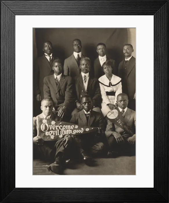 Framed Print : African American men and woman with Overcome evil with good and Live wires, banners. Photo by Arthur P